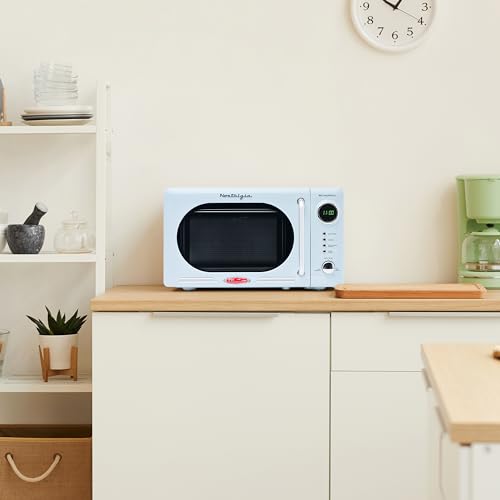 Pink 0.7 Cu. Ft. Compact Countertop Microwave Oven U734245